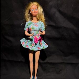 Barbie Blonde Doll in Blue Floral Dress with Pink Bow Accent